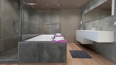 Badezimmer mit Dusche und Badewanne im Beton-Stil Badezimmer mit Dusche und Badewanne im Beton-Stil